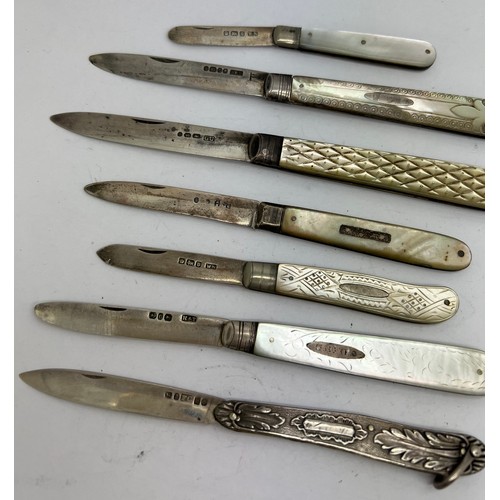 833 - Seven various silver bladed fruit knives with mainly mother of pearl handles. Various dates and make... 