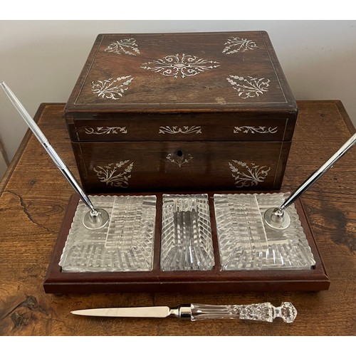 730 - A 19thC rosewood and mother of pearl inlaid box together with a Waterford Crystal desk set with two ... 