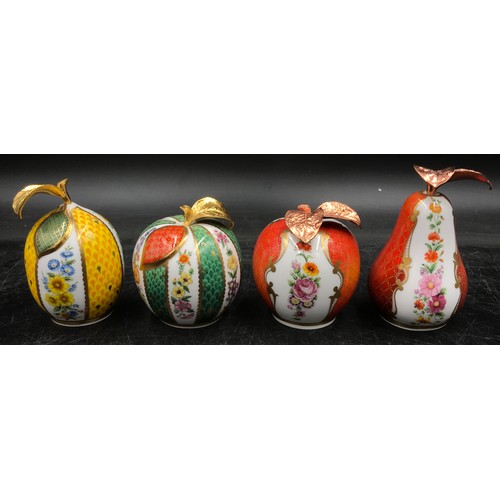 255 - A collection of Royal Worcester fruit themed candle snuffers to include pear, apple, peach and lemon... 