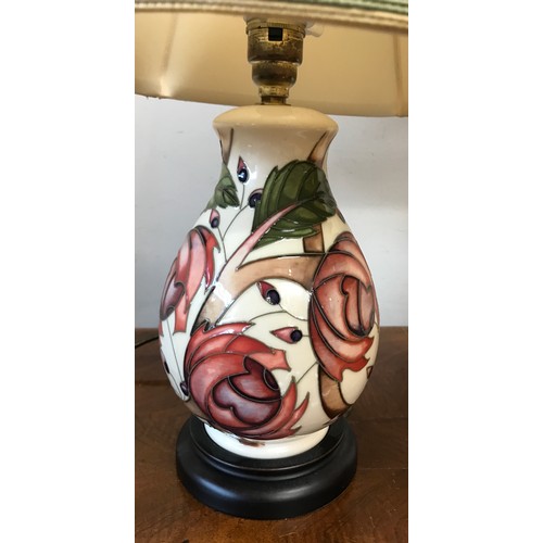 749 - Two matching Moorcroft table lamps with pink flower design tallest to top of shade 75cm.