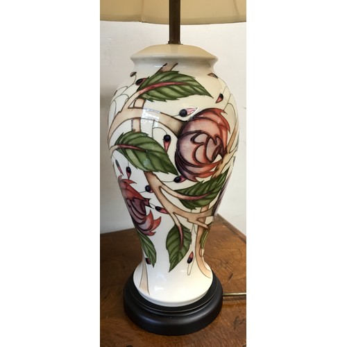 749 - Two matching Moorcroft table lamps with pink flower design tallest to top of shade 75cm.