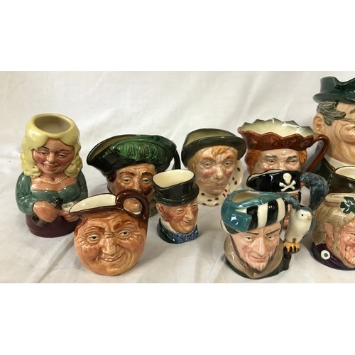 264 - A collection of 20 Royal Doulton toby and character jugs Mr Pickwick, Betty Bittens, The Falconer an... 