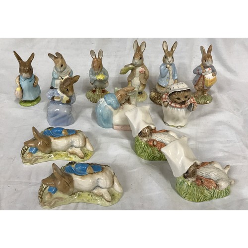 267 - ROYAL ALBERT: a collection of thirteen Beatrix Potter figures including Peter and the Red Pocket Han... 