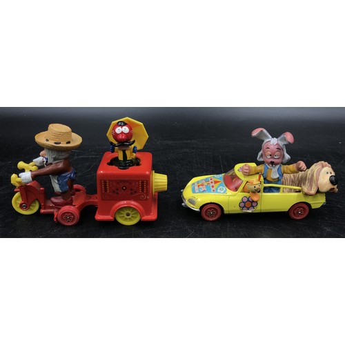 912 - A collection of vintage children's toy cars from film and TV to include Corgi Toys The magic roundab... 