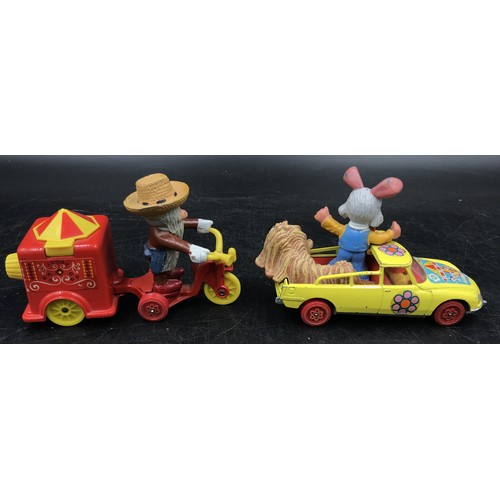 912 - A collection of vintage children's toy cars from film and TV to include Corgi Toys The magic roundab... 