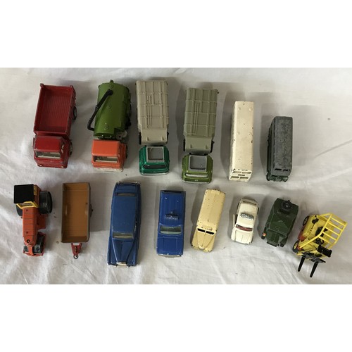 914 - A collection of Dinky toy cars and trucks to include a Ford D 800, 2x Bedford Refuse Wagons, Daimler... 