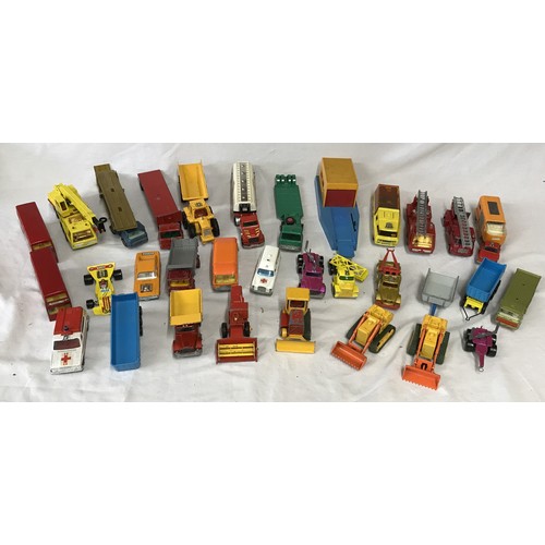 915 - A collection of Matchbox cars, trucks, buses and trailers from collections such as Speed Kings, Supe... 