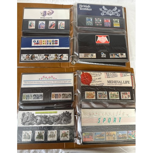 672 - Two boxes to include 2 x Royal Mail F.D.C albums 1980's covers, 2 x Royal Mail P.H.Q. card albums an... 