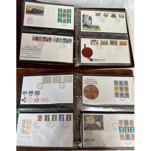 672 - Two boxes to include 2 x Royal Mail F.D.C albums 1980's covers, 2 x Royal Mail P.H.Q. card albums an... 