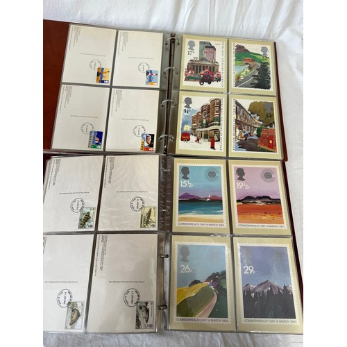 672 - Two boxes to include 2 x Royal Mail F.D.C albums 1980's covers, 2 x Royal Mail P.H.Q. card albums an... 