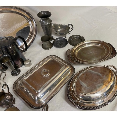 774 - A collection of silverplate items to include 5x teapots, lidded serving dishes, trays and jug along ... 