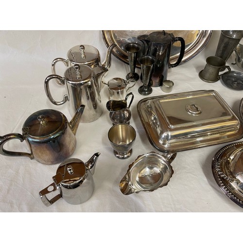 774 - A collection of silverplate items to include 5x teapots, lidded serving dishes, trays and jug along ... 