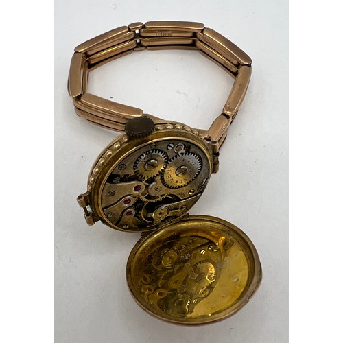 627 - A 9 carat gold cased wristwatch on expanding strap. Strap marked 9c CBB. total weight 26.8gm.

Strap... 