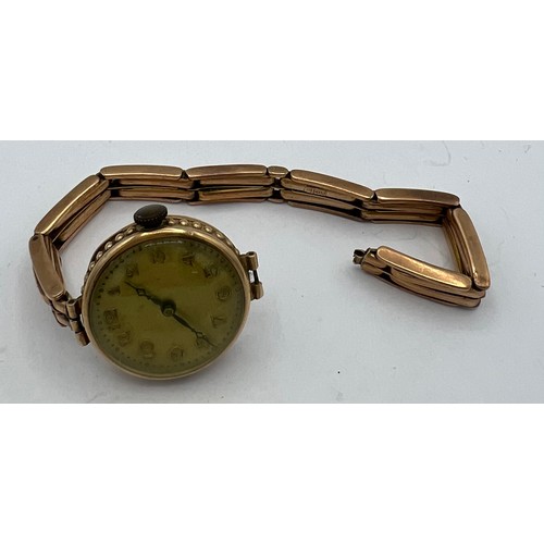 627 - A 9 carat gold cased wristwatch on expanding strap. Strap marked 9c CBB. total weight 26.8gm.

Strap... 