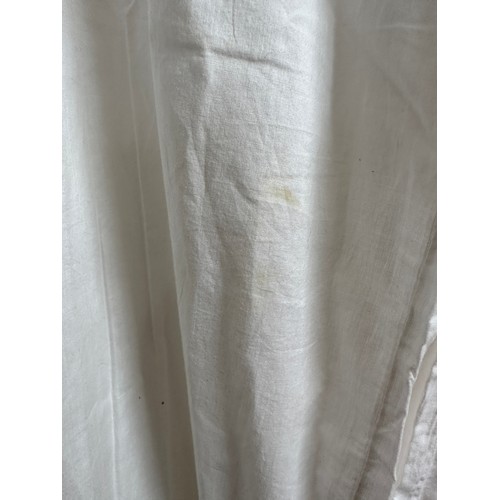 1058 - Two early 20thC cotton nightgowns and two small table cloths. Longest nightgown 120cm.