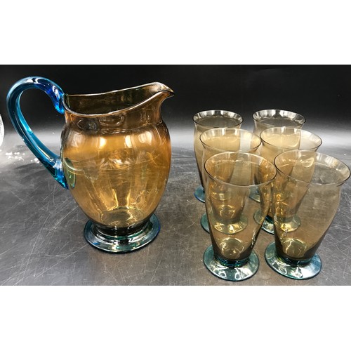 366 - Water set consisting of one jug 19cm h and six glasses along with a heavy blue Murano style bowl wit... 