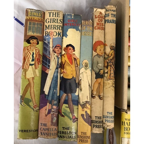 980 - A large collection of early 20thC children's books to include School Boy and School Girl Annuals, To... 