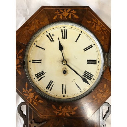 1024 - American drop-dial wall clock in an inlaid case, with white dial and roman numerals, 50cm h, has pen... 