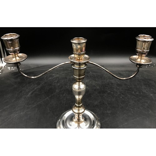 839 - Weighted silver 3-branch candelabra 1972 Charles S Green & Co Ltd.