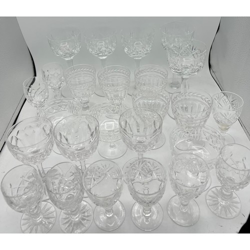 371 - A quantity of good quality cut glass to include wine and sherry glasses.