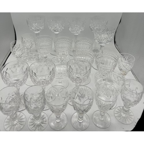 371 - A quantity of good quality cut glass to include wine and sherry glasses.