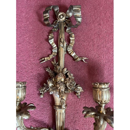 754 - A pair of good quality decorative ormolu wall sconces. 55cm h.