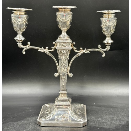 777 - A pair of good quality late 19thC silverplated twin branch candelabras with square bases decorated w... 