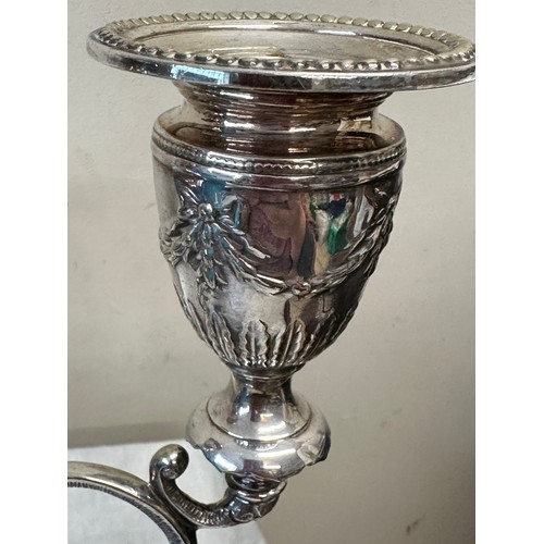 777 - A pair of good quality late 19thC silverplated twin branch candelabras with square bases decorated w... 