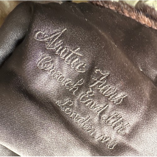 1060 - A fur Stole by Artic furs London approx. 200l x 48cm w with initials to lining together with intertw... 