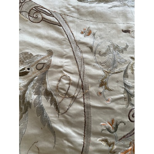 1064 - A large good quality Chinese silk embroidered panel with orange silk lining. Approx. 218 x 308cm.