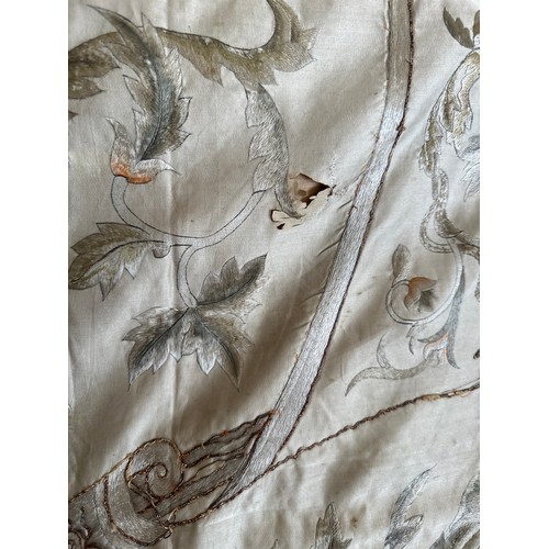 1064 - A large good quality Chinese silk embroidered panel with orange silk lining. Approx. 218 x 308cm.