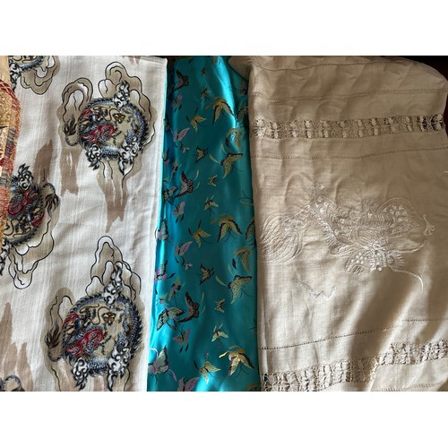 1065 - Oriental theme fabric pieces and two Chinese embroidered cloths one with drawn thread work. (5) Blue... 