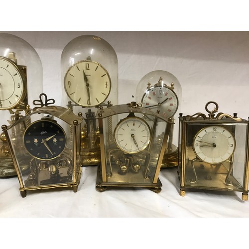 1029 - A collection of 8 mantel clocks 5 with domes tallest 30cm h. Three are Kern, Germany, 2 Bentima, 1 H... 