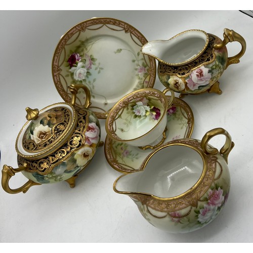 282 - Two Noritake jugs, lidded sucrier and a cup, saucer and plate.