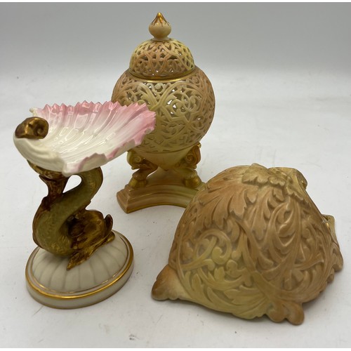 286 - Three pieces of Grainger Worcester to include dolphin and shell 10cm h, reticulated lidded jar and a... 