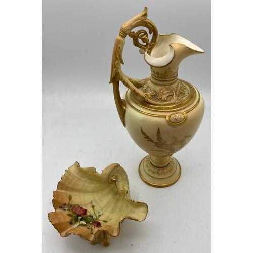 287 - Two pieces of Royal Worcester to include a jug with fern decoration 29cm h and a floral painted shel... 