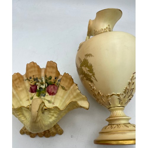 287 - Two pieces of Royal Worcester to include a jug with fern decoration 29cm h and a floral painted shel... 