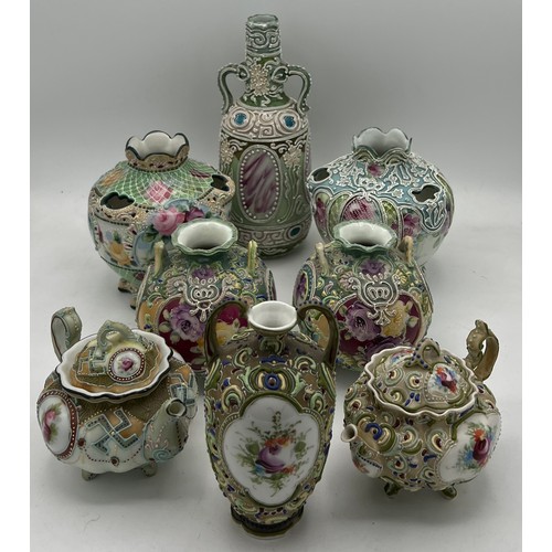 288 - Eight pieces of Japanese moriage decorated ceramics to include teapots and vases. Tallest vase 21cm ... 