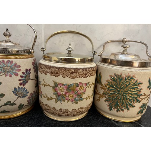 293 - Four Taylor Tunnicliffe biscuit barrels with silver plated mounts.