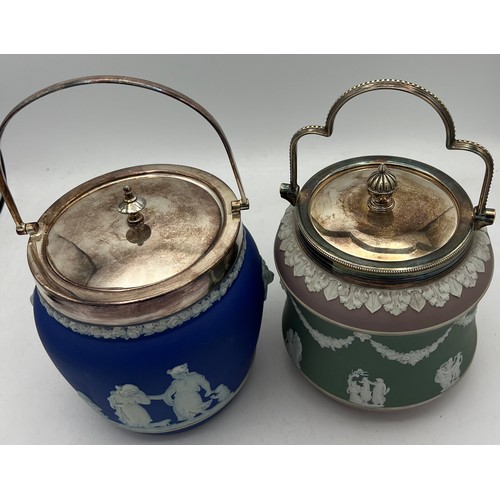 295 - Two Wedgwood Jasperware biscuit barrels with silver plated mounts and swing handles.