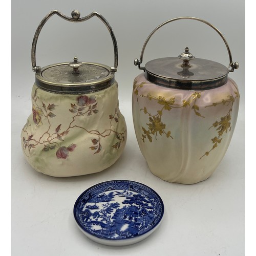 296 - Two Taylor Tunnicliffe biscuit barrels with plated mounts and swing handles together with a Willow p... 