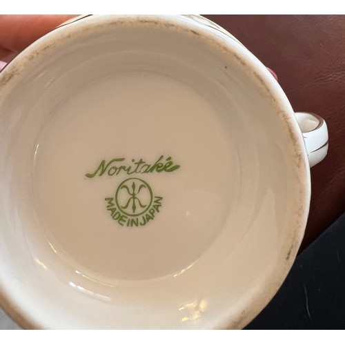 297 - A Noritake coffee service comprising coffee pot, milk, sugar and six cups and saucers.