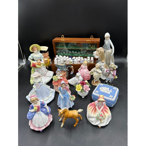 299 - A quantity of ceramic figures to include Royal Doulton x 6, Lady Jane 1997, Monica HN 3617, Valerie ... 