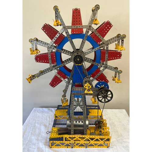 927 - A Meccano window display model of a steam engine Ferris wheel approx. dimensions 71cm h x 54cm w x  ... 