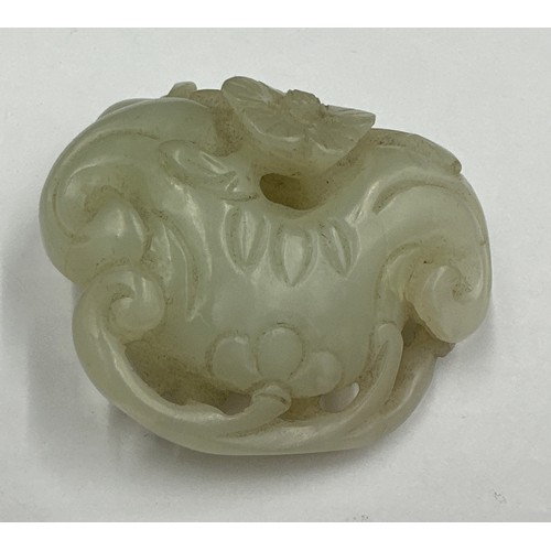 878 - A small jade group depicting catfish, probably Qing dynasty. 5 x 5.5cm.