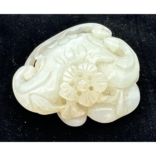 878 - A small jade group depicting catfish, probably Qing dynasty. 5 x 5.5cm.