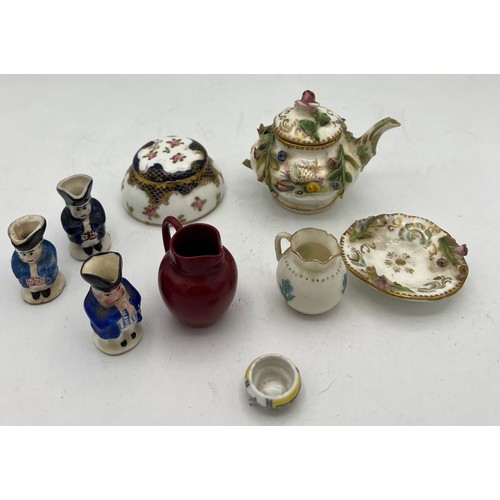 300 - A quantity of miniature ceramics to include Crown Staffordshire Toby jug, Limoges dish, Doulton Flam... 