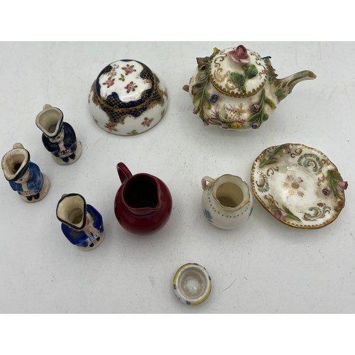 300 - A quantity of miniature ceramics to include Crown Staffordshire Toby jug, Limoges dish, Doulton Flam... 