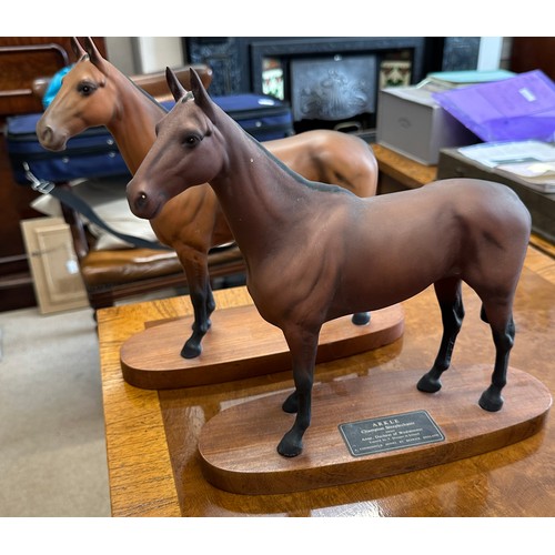 302 - Two Beswick Arkle champion steeplechaser horses on stands one with plaque tallest with base 30h toge... 