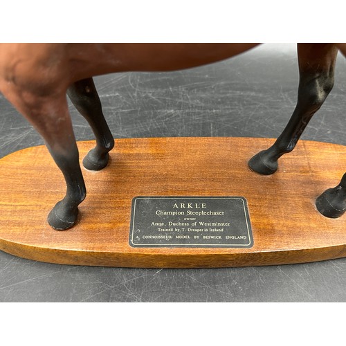 302 - Two Beswick Arkle champion steeplechaser horses on stands one with plaque tallest with base 30h toge... 